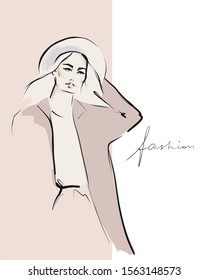 Hand-drawn beautiful girl in hat and coat. Fashion illustration in sketch style. Vector