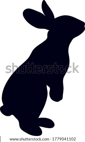 Hand-drawn black silhouette of cute rabbit, looking up and sitting in various poses rabbits black silhouette ,isolated on white background .Vector illustration.