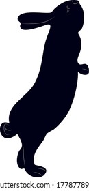 Hand-drawn black silhouettes of cute rabbits sitting in various poses, Isolated On White Background. Detailed vector Illustrations.