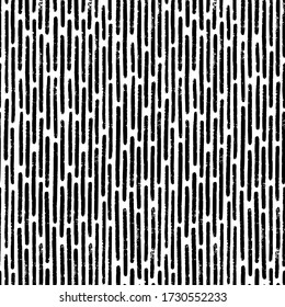 Hand-drawn black and white seamless texture with dashed strokes. Vector pattern.