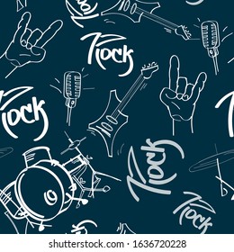 hand-drawn brushes, guitars, microphones, a drum kit and ROCK inscriptions are randomly arranged on a dark azure background. dark hardrock seamless pattern. vector