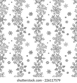 Hand-drawn Christmas snowflake seamless pattern for wrapping paper or textile design / Vector Illustration