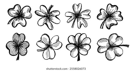 Hand-Drawn Clover Leaves Set in Retro Colors for St. Patrick's Day. Four and three leaf clovers. Vector ink drawn doodle elements