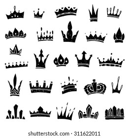 Hand-drawn crowns collection. Ink sketch. Vector design elements.