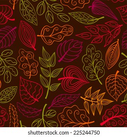 Hand-drawn dark seamless pattern with leaves. Vector sketch background.