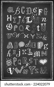 hand-drawn doodle alphabets on chalkboard
