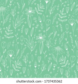 Handdrawn doodle flowers and leaves vector seamless pattern. Spring summer print for fabric and paper. Stem petals branches herb in sketchy style.
