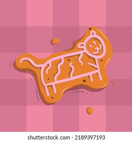 Handdrawn doodle illustration with striped cute tiger. A line drawing with a wild animal on a brown cookie with chocolate chips on a checkered tablecloth. Delicious Christmas gingerbread with icing