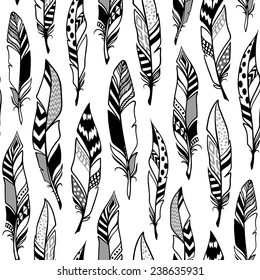 hand-drawn doodle seamless pattern with feathers 
