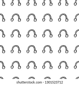 Handdrawn doodle seamless pattern headphones icon. Hand drawn black sketch. Sign symbol. Decoration element. White background. Isolated. Flat design. Vector illustration.