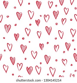 Hand-drawn doodle seamless pattern with hearts and dots. Design elements for Valentine's day. Red.