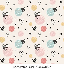 Hand-drawn doodle seamless pattern with hearts and circles. Vector design.