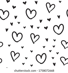 Hand-drawn doodle seamless pattern with hearts. Valentine's day background. Heart doodles texture.
