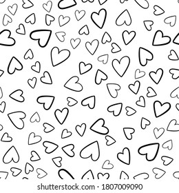 hand-drawn doodle seamless pattern with hearts