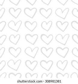 hand-drawn doodle seamless pattern with hearts