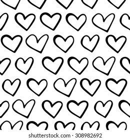 hand-drawn doodle seamless pattern with hearts