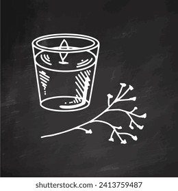 Hand-drawn doodle wax candle in a glass jar-candlestick with a twig on chalkboard background. Beauty cosmetic element, self care. Sketch style.	