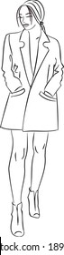 Hand-drawn fashion illustration with a standing fashionable girl in dress-jacket or coat. Fashionable clothes. Fashionable sketch
