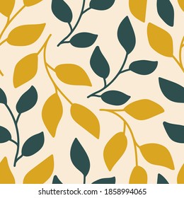 Hand-drawn floral vector seamless pattern in trending colors. Golden, blue-green leaves twigs on a light pink background. For prints of fabric, packaging, textile products.