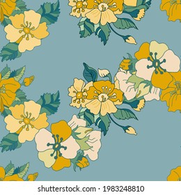 Hand-drawn floral vector seamless pattern in trending colors. Golden, blue-green leaves twigs on a light pink background. For prints of fabric, packaging, textile products.