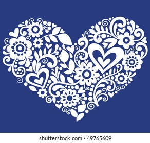 Hand-Drawn Flowers, Leaves, and Swirls in the Shape of a Heart- Vector Illustration on Blue Background