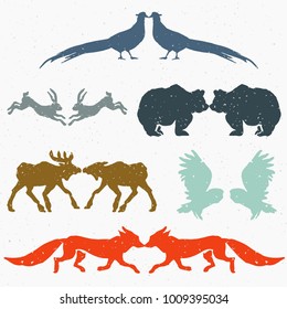 Hand-drawn forest silhouettes animals:elk, fox, hare, bear, owl, pheasant
