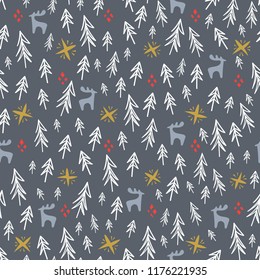 Hand-drawn forest silhouettes seamless pattern.