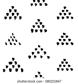 Hand-drawn grunge pattern with a dry brush using black ink. Seamless pattern made of geometric shapes, strokes and spots. Vector background can be used in printing, fabric, packaging, fashion, wraping