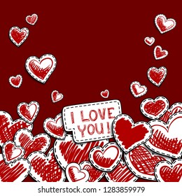 Hand-drawn hearts on a red background and the inscription I love you. Freehand drawing.