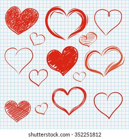 Handdrawn hearts set on the checked paper. Eps 10 vector file.