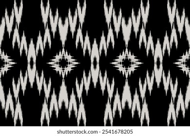 Hand-drawn Ikat geometric folklore ornament with diamonds. Tribal ethnic vector texture. Seamless striped pattern in Aztec style. Great for textiles, banners, wallpapers, and wrapping vector design.