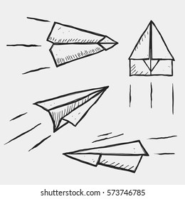 Hand-drawn isolated paper planes. Sketch on tnotebook.