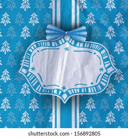 Hand-drawn label and paper bow on patterned background with fir trees covered with snow  and old crumpled paper texture, Christmas background