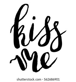 Handdrawn lettering of a phrase Kiss me. Unique typography poster or apparel design. Modern brush calligraphy. Vector art isolated on background. Valentine typography quote.