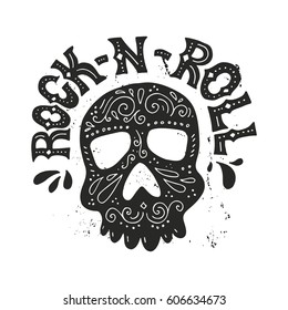 Handdrawn lettering with skull and rock-n-roll sign. T-shirt design. Rock concert poster. Typographical poster made in vector.