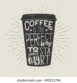 Hand-drawn paper cup silhouette of coffee with lettering and sunburst. Creative vector illustration. Typography design for posters, logo, label, advertising cafe or shop.