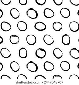 A hand-drawn, seamless, black and white vector pattern featuring a grid of grunge circles. This design adds a contemporary touch, suitable for textiles, posters, cards, and various creative projects.