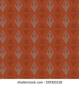 Hand-drawn seamless pattern with abstract geometric elements. Decorative brown vector ornamental background with triangles and rhombuses. Can be used for textile design, bag template, packaging.