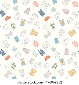 Hand-drawn seamless pattern of children clothes. Vector illustration can be used for wallpaper, website background, wrapping paper. Sketch elements of cartoon baby outfit