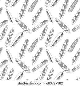 Hand-drawn seamless pattern with doodle feathers. Sketch style, trendy boho chic. Tribal template