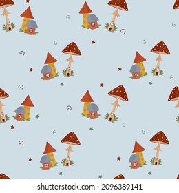 Hand-drawn seamless pattern with houses. Magic mushroom houses on a blue background. Design for children's clothing, stationery. Vector flat illustration
