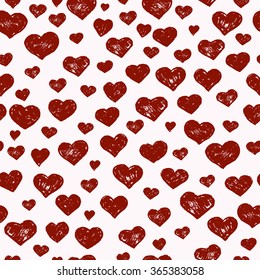 Hand-drawn seamless pattern with red hearts. Vector illustration