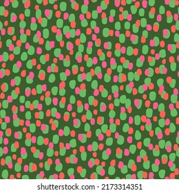 Hand-drawn seamless pattern with vibrant abstract shapes. Smears of red paint on a deep green background.  Fabric print companion design. Creative stylish illustration for paper and gift wrap.
