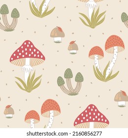 Hand-drawn seamless pattern with wild mushrooms and autumn leaves. Colorful seasonal illustration for paper and gift wrap. Fabric print design. Creative stylish background.