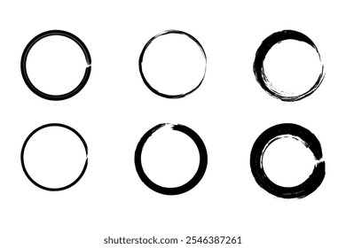 Conjunto de pinceladas circulares dibujadas a mano que representan el zen enso de la caligrafía japonesa. Presenta diseños abstractos con bordes ásperos.