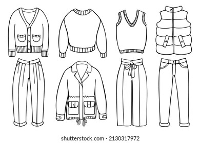 Hand-drawn set of clothes for cold weather. Doodle garment items isolated on the white background