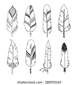 Handdrawn set of feathers isolated on white background. Vector tribal, ethnic, aztec, hipster style