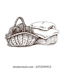 Hand-drawn sketch of basket with balls of yarn, wool, knitted goods. Knitwear, handmade, knitting equipment concept in vintage doodle style. Engraving style.  