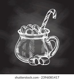 Hand-drawn sketch of hot drink with marshmallows and candy cane in a mug on chalkboard background. Hot chocolate, cocoa. Vector food drawing. Vintage cozy seasonal holidays.