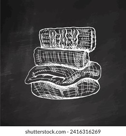 Hand-drawn sketch of knitted clothes on chalkboard background. Knitwear, handmade concept in vintage doodle style. Engraving style.	